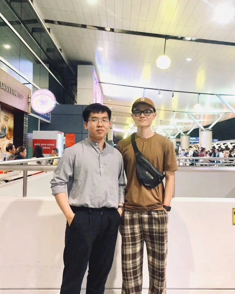 Thang and Chris at the airport — Chris departing for his Philippines business training